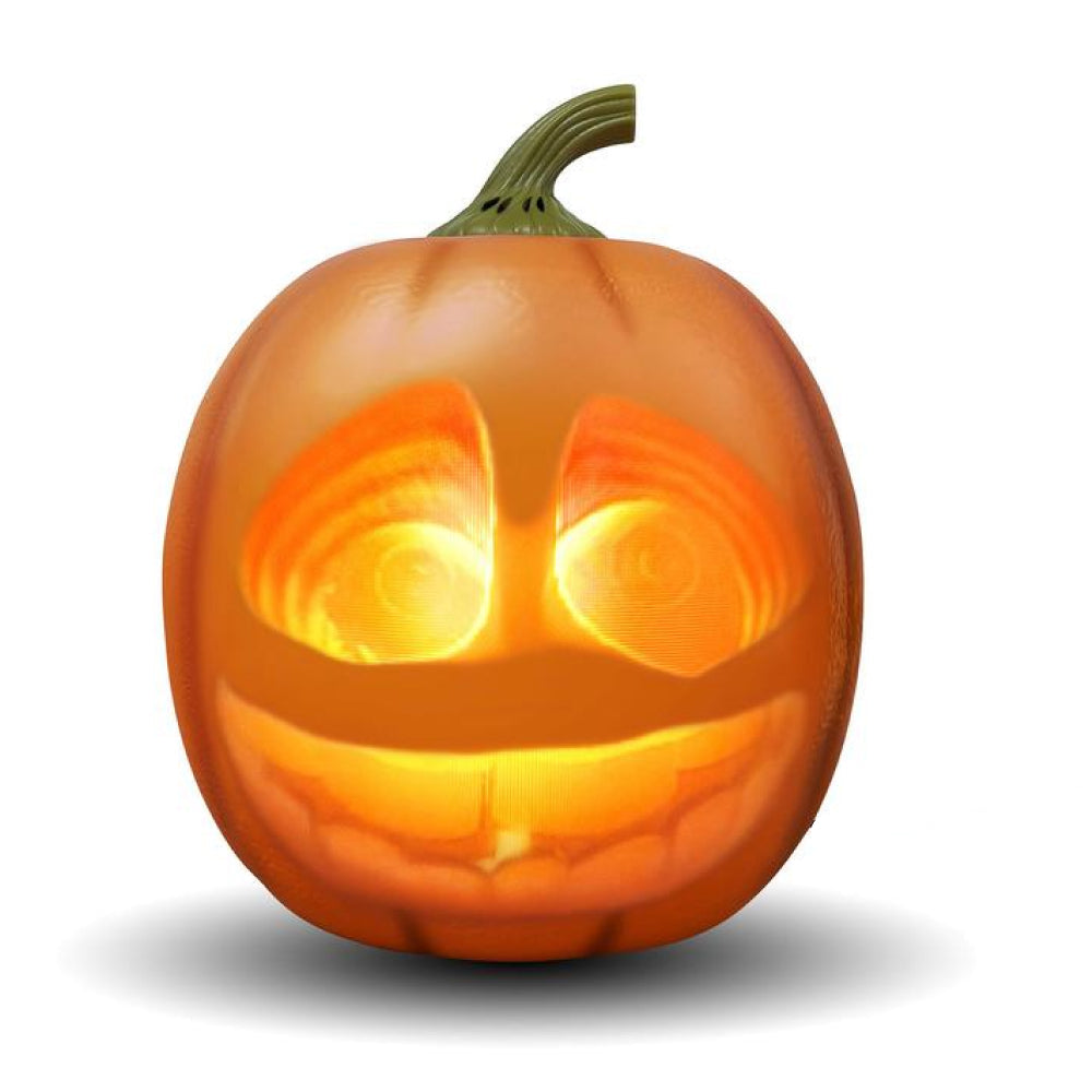 Luminous pumpkin with a carved face on a white background