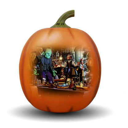 Decorative pumpkin with a Halloween scene featuring characters and props.