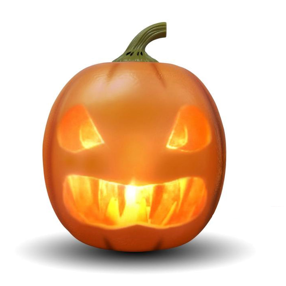 Carved pumpkin with glowing interior on a white background