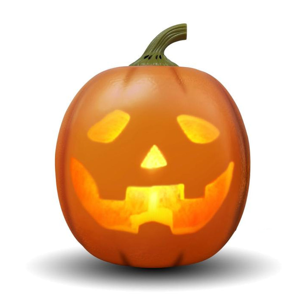 Decorative pumpkin with a carved face on a white background